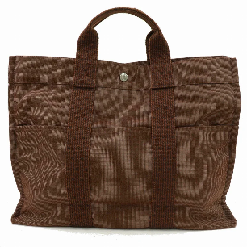 Luxury bags with exotic skinsIndistinguishable  Hermes Tote Bag Other Brown Canvas (SHC1-14745)